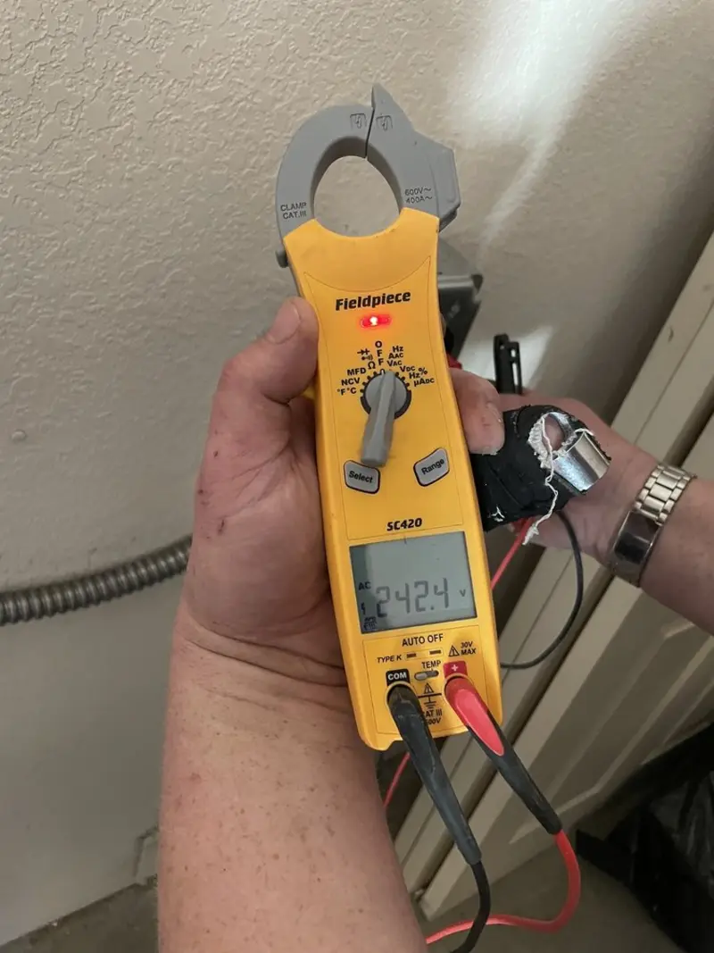 Voltage testing with clamp meter during Circuit Breaker Repair in Johnson